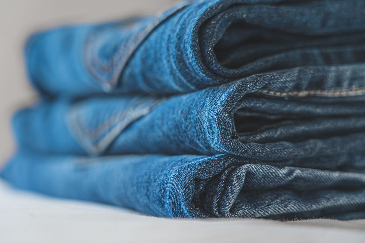 Folded women's denim jeans